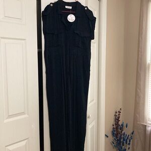 Ladies jumpsuit …Never worn with label.
